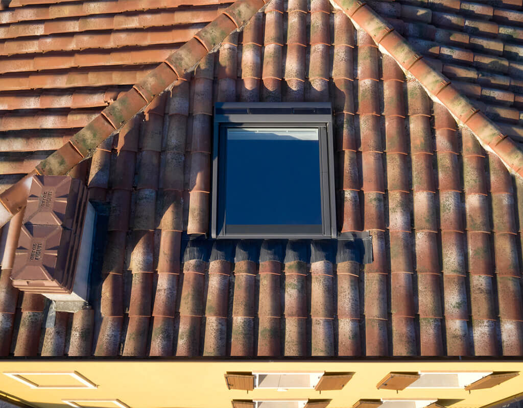Come pulire le finestre per tetti 